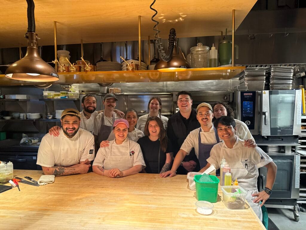 Meeting chef's after chef's menu tasting at Matty Matheson's restaurant Prime Seafood Palace in Toronto